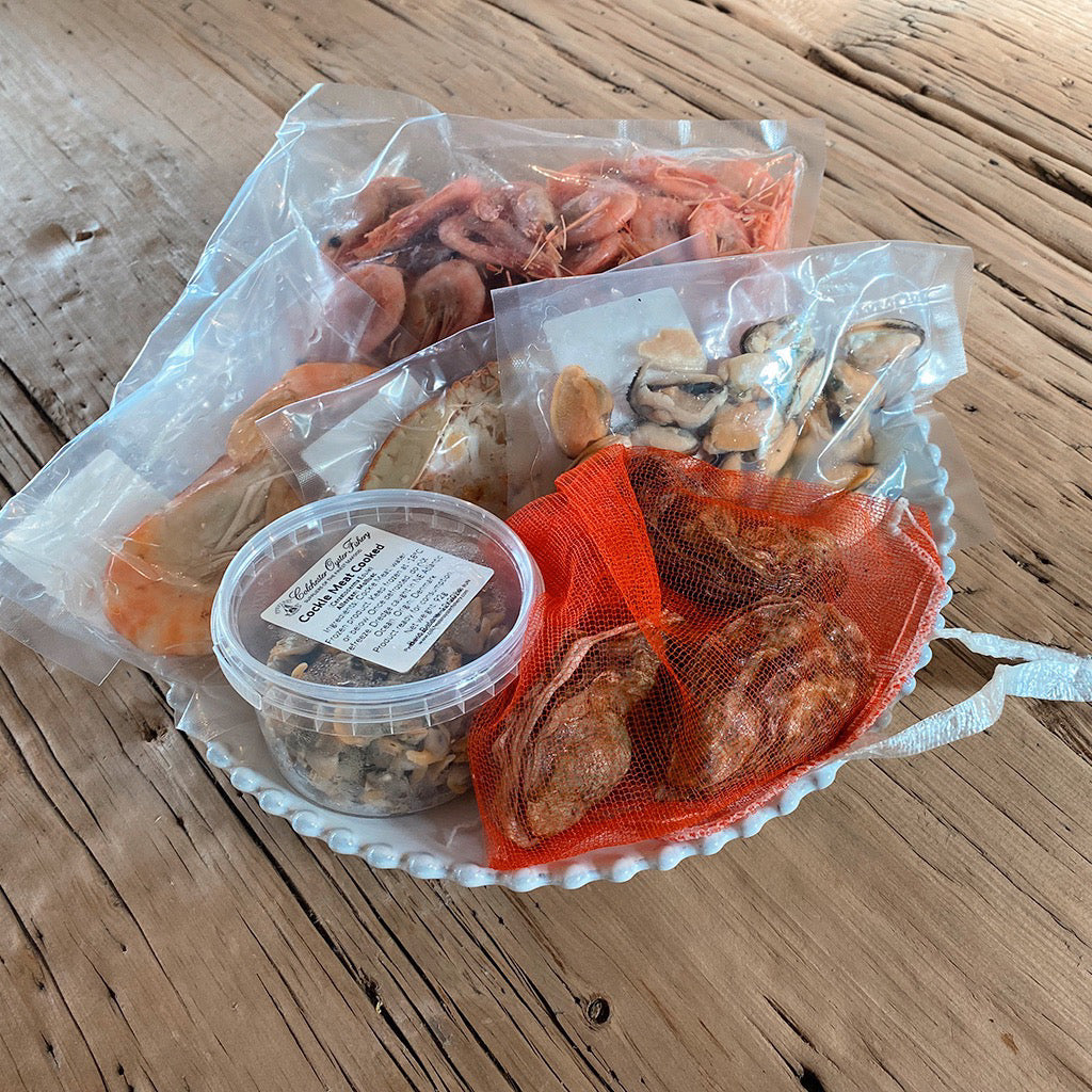 The seafood platter as it arrives, all items come individually packaged.
