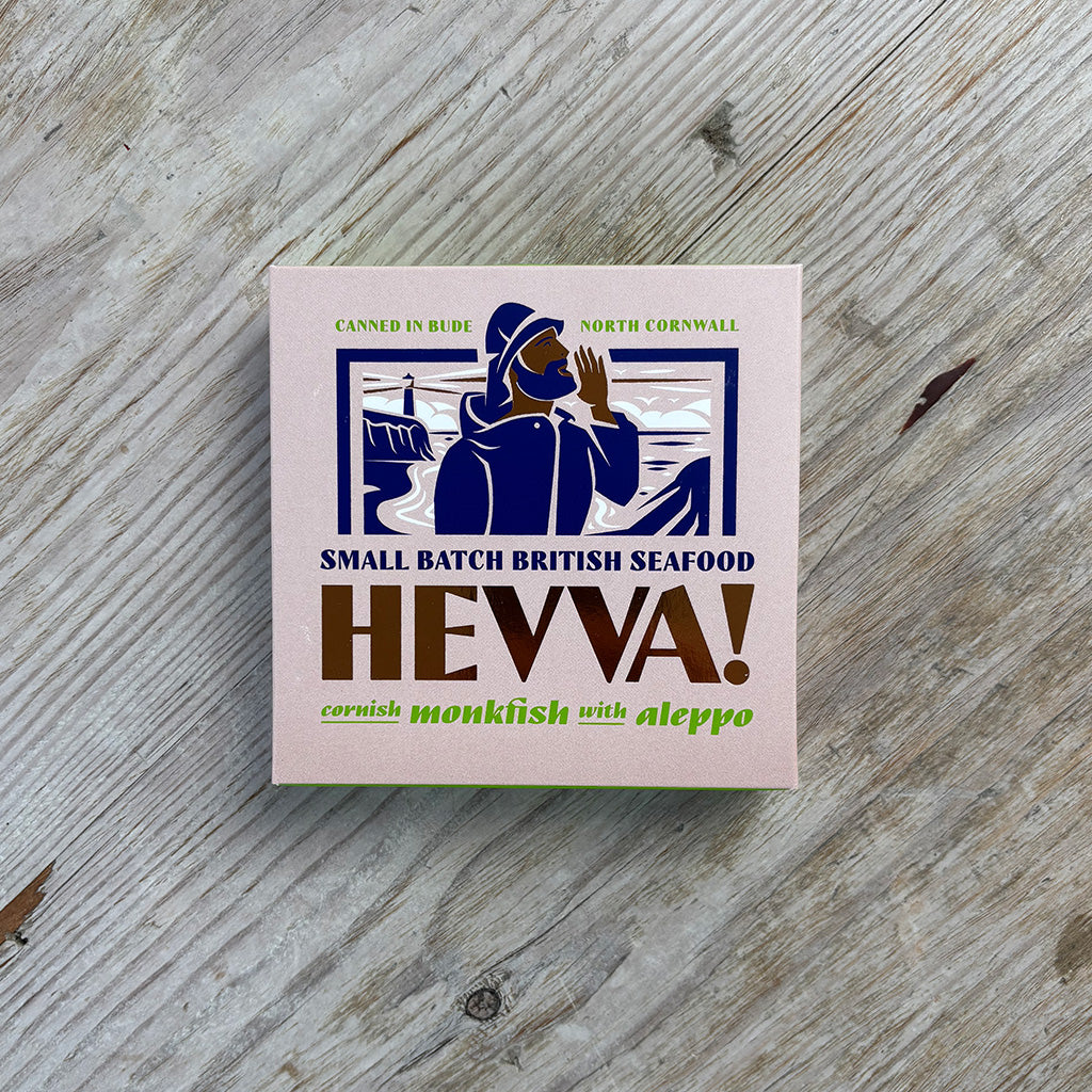 HEVVA! seafood product packaging on a wooden surface