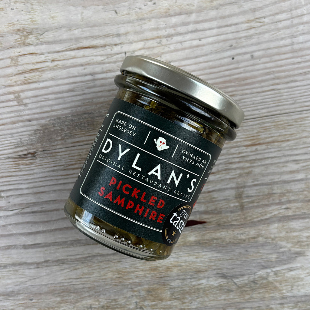 Jar of Dylan's Pickled Samphire on a wooden surface