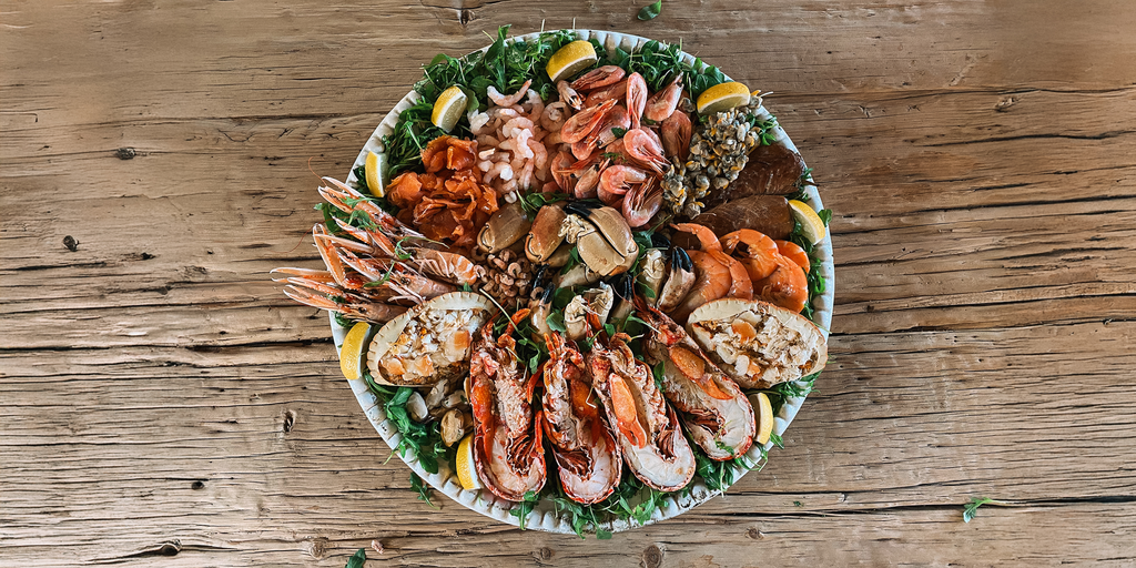 Assorted seafood platter on a wooden table